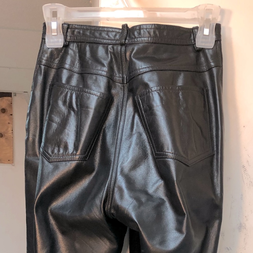 Woman Danier Leather pants: circ: 25,5", across: 12,5"
OL: 42,5" inseem: 31"